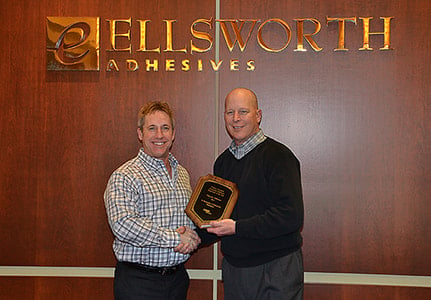 Matt Ryan (left) of LORD® presenting the award to Ellsworth Adhesives Vice President Roger Lee